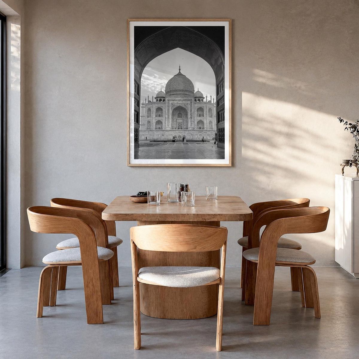 India black & white photo poster of Asia – vertical wall art in natural wood frame with white border, hanging on wall