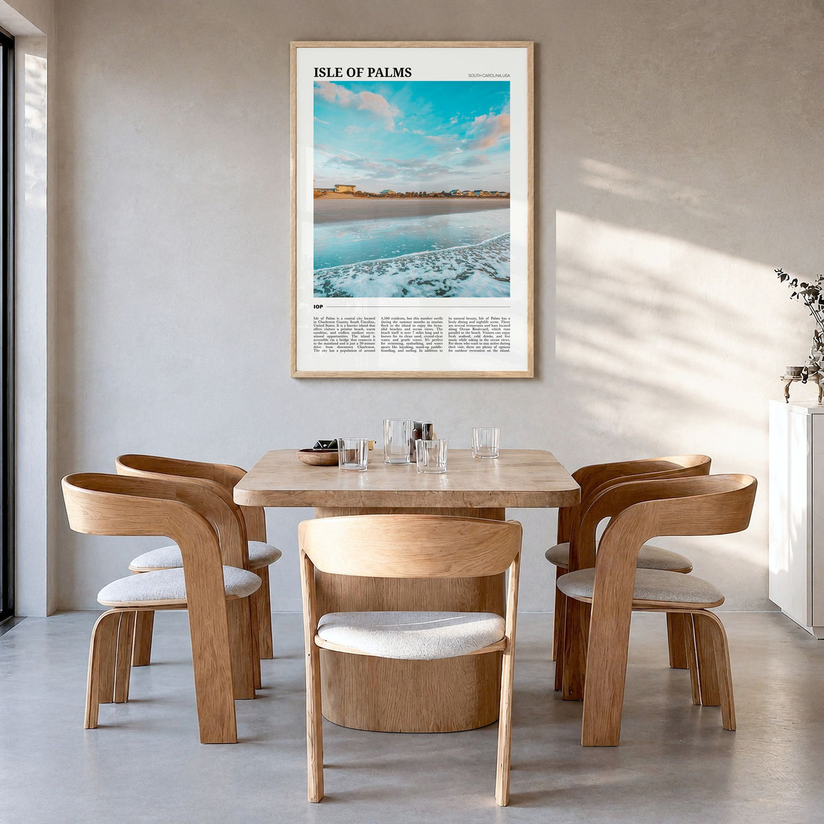 Isle of Palms Travel Poster in a natural wood frame, hanging in a dining room