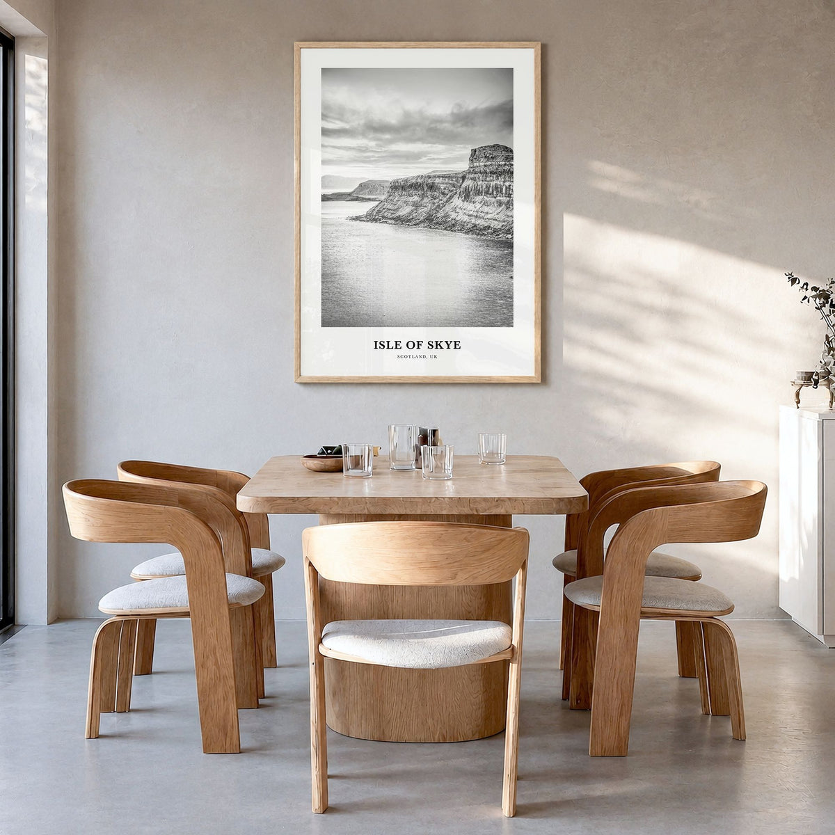 Isle of Skye Classic Poster in a natural wood frame, hanging in a dining room
