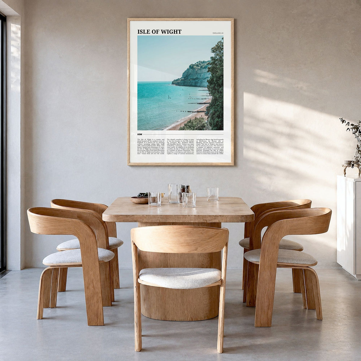 Isle of Wight Travel Poster in a natural wood frame, hanging in a dining room