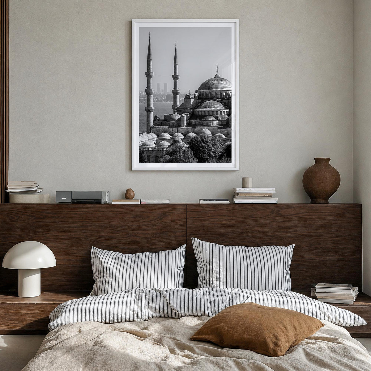 Istanbul black & white photo poster of Türkiye – vertical wall art in white wood frame with white border, hanging on wall