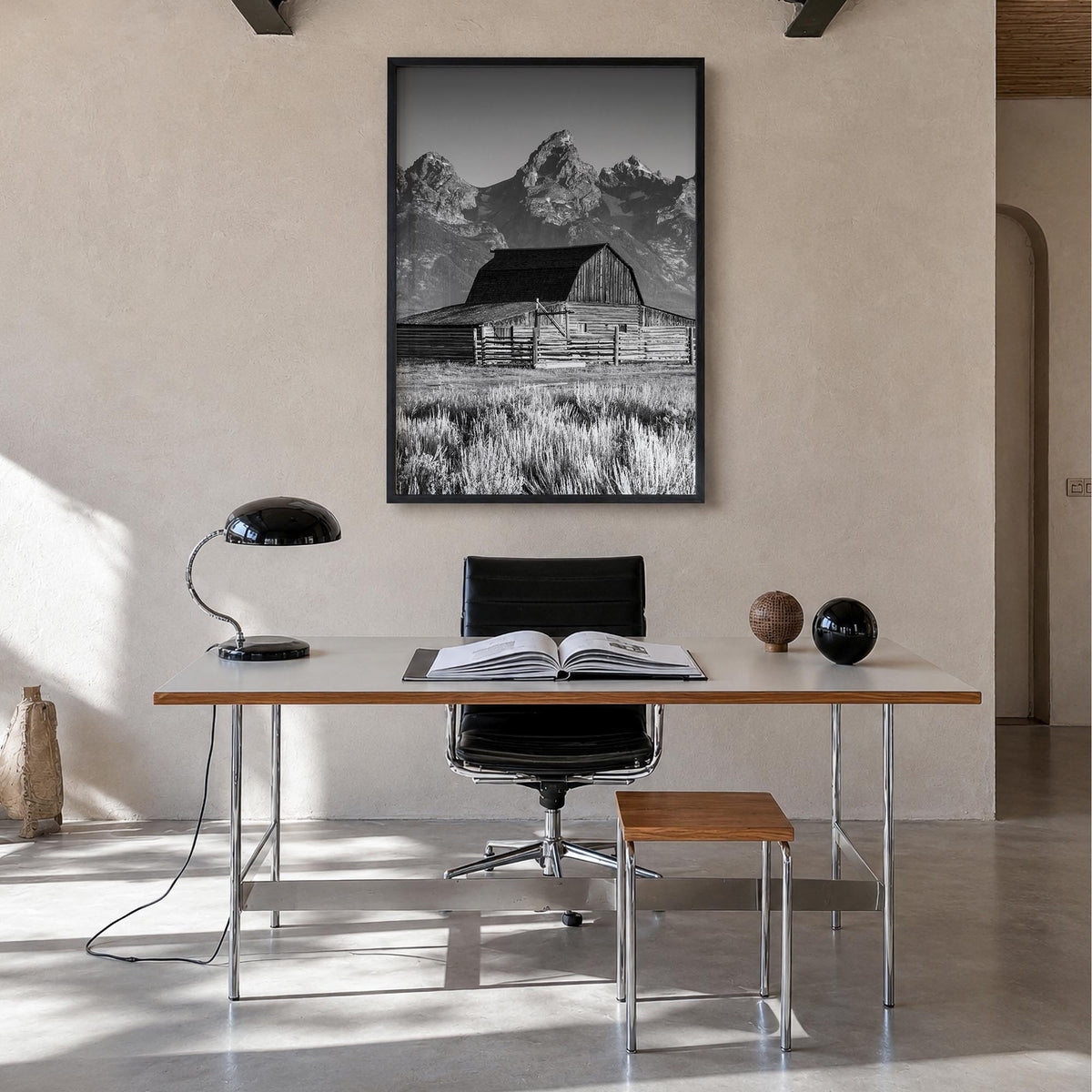 Jackson Hole black & white photo poster of Wyoming, USA – vertical wall art in black wood frame, hanging on wall