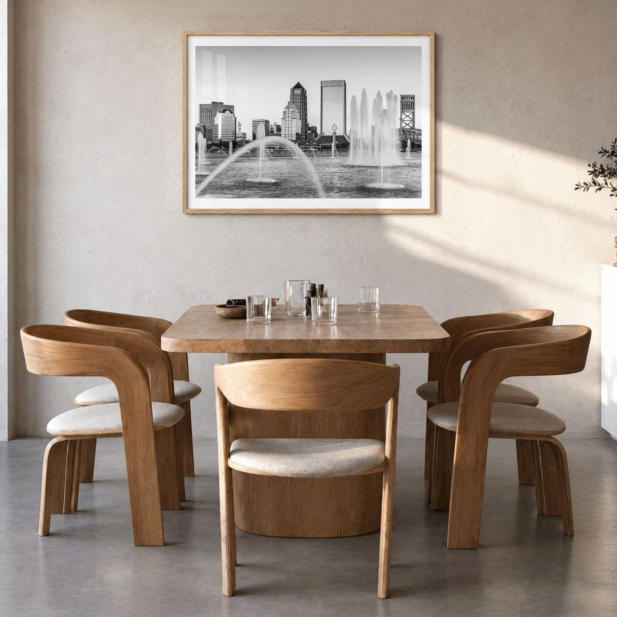 Jacksonville Photo Poster in a natural wood frame, hanging in a dining room, white border
