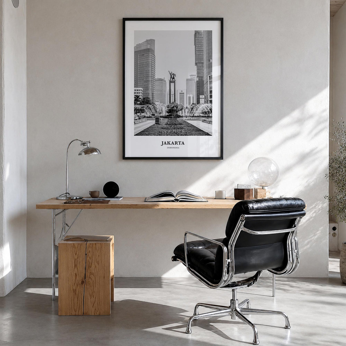 Jakarta no. 2 black & white classic poster of Indonesia – vertical wall art in black wood frame, hanging on wall