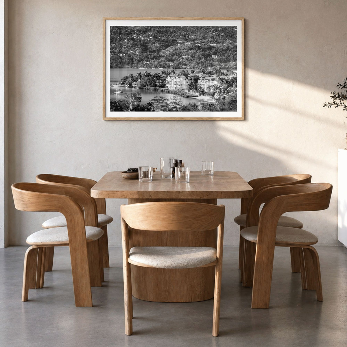 Jamaica Photo Poster in a natural wood frame, hanging in a dining room, white border