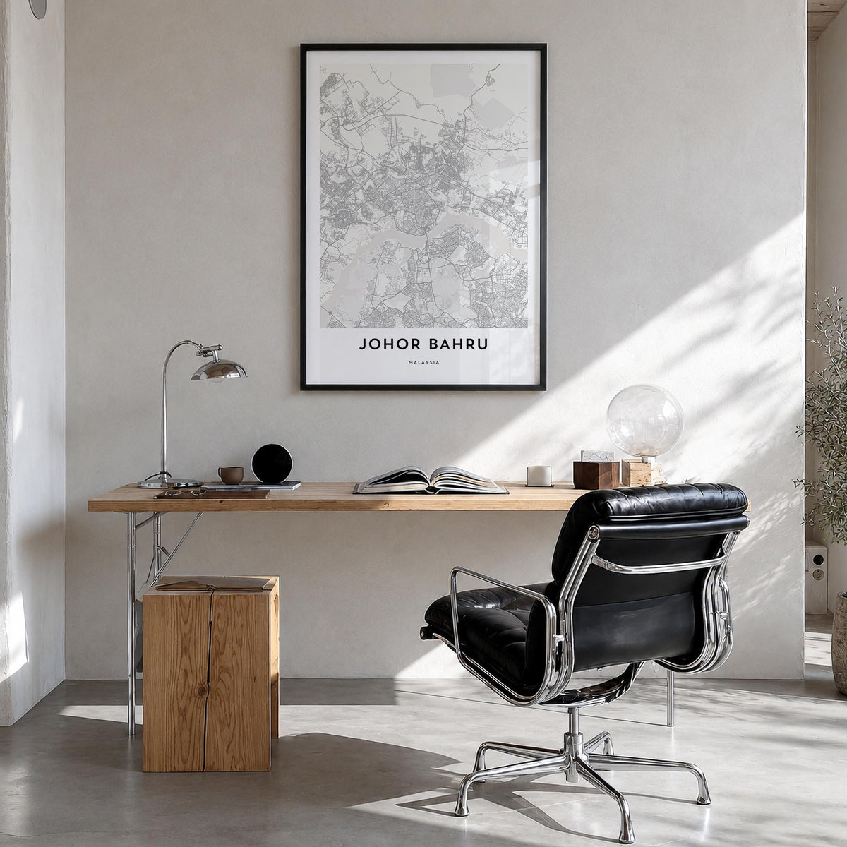 Johor Bahru black & white map poster of Malaysia – vertical wall art in black wood frame, hanging on wall