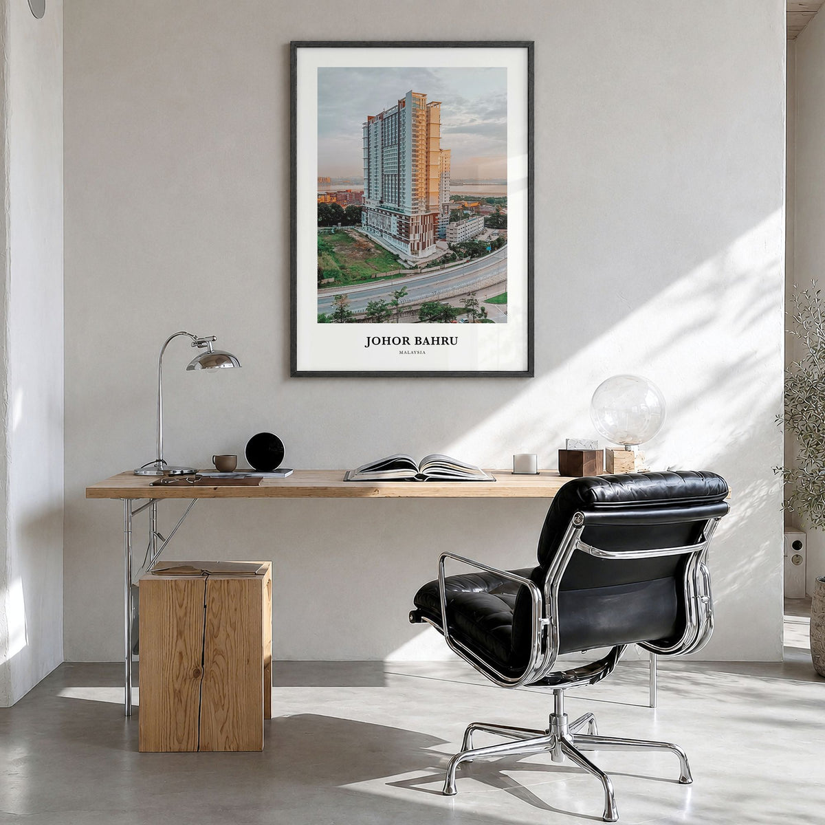 Johor Bahru Classic Poster in a black wood frame, hanging in a bright home office