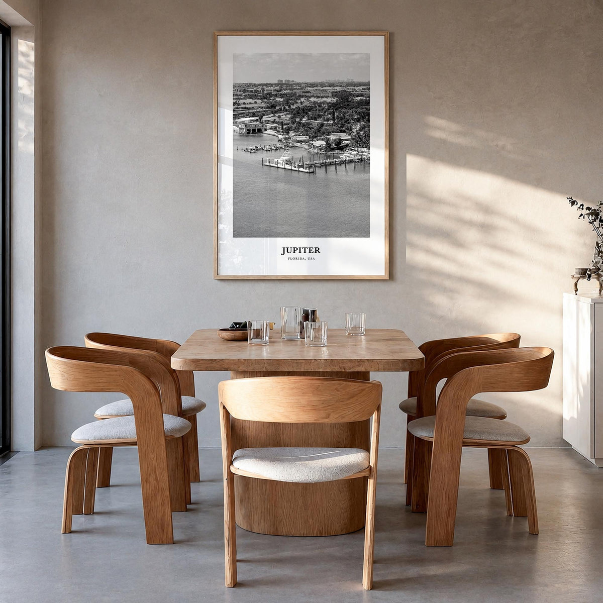 Jupiter black & white classic poster of Florida, USA – vertical wall art in natural wood frame, hanging on wall