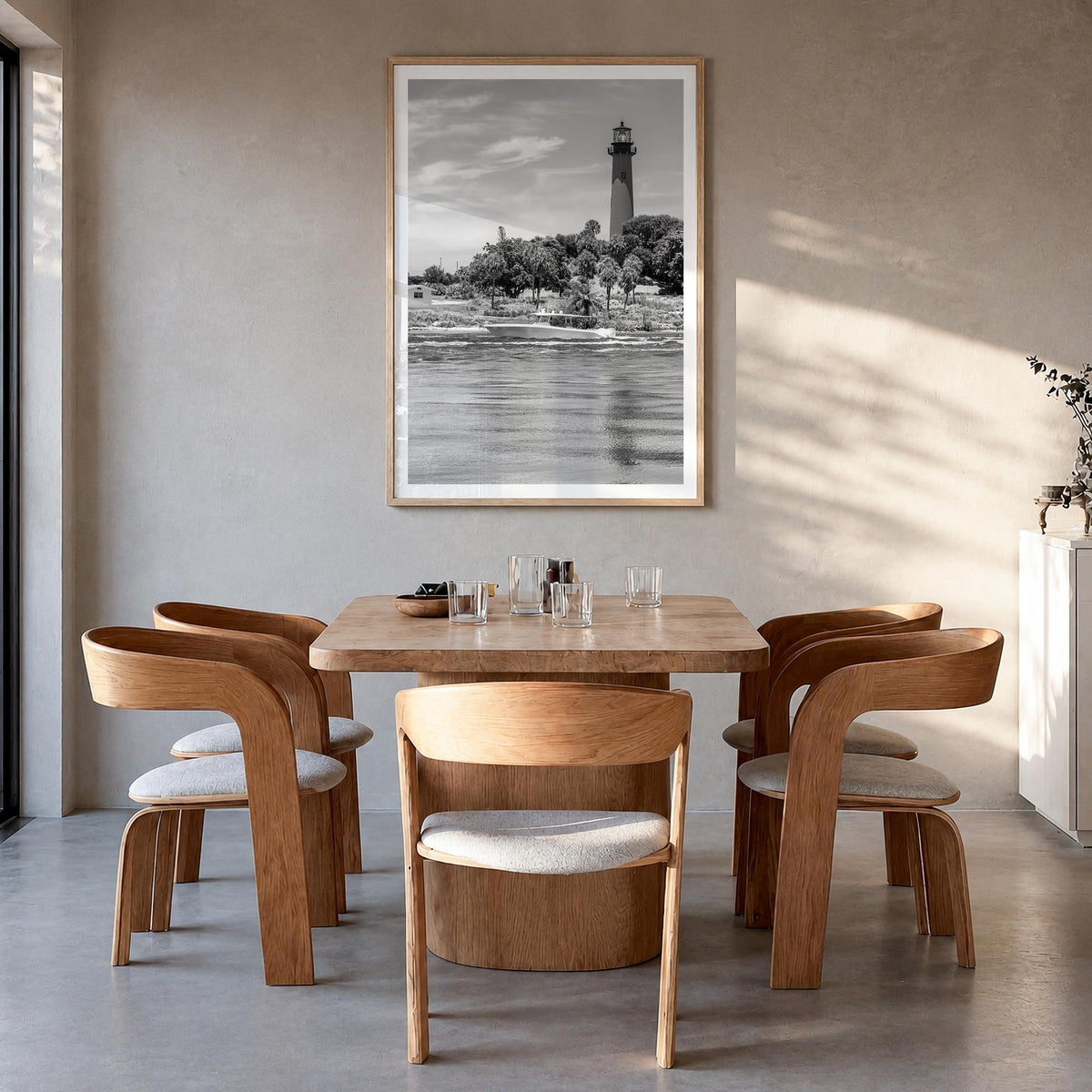 Jupiter black & white photo poster of Florida, USA – vertical wall art in natural wood frame with white border, hanging on wa