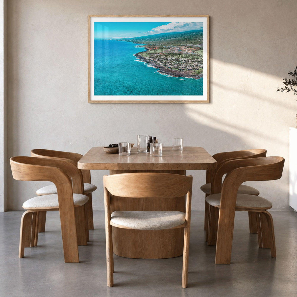 Kailua-Kona Photo Poster in a natural wood frame, hanging in a dining room, white border