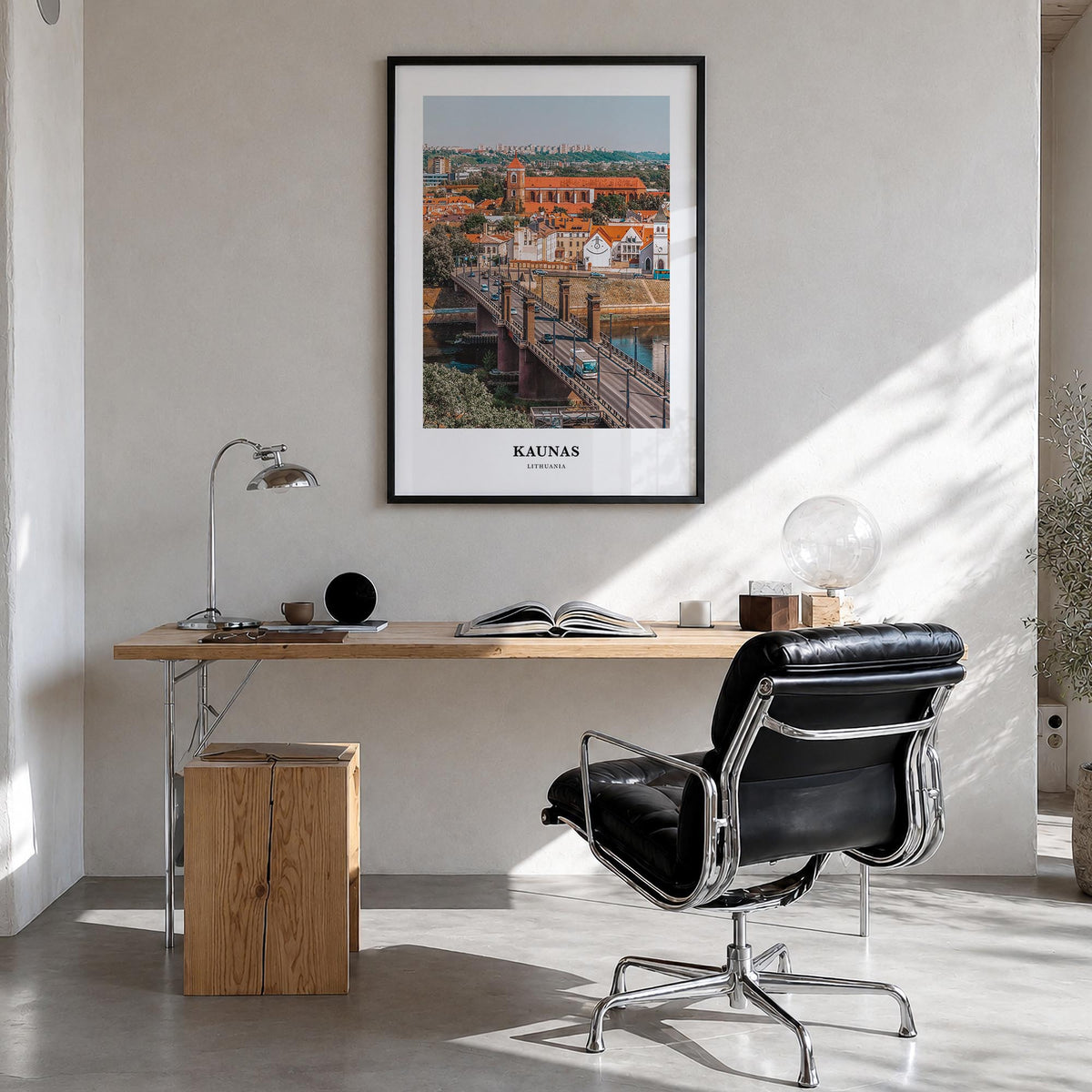 Kaunas colorful classic poster of Lithuania – vertical wall art in black wood frame, hanging on wall
