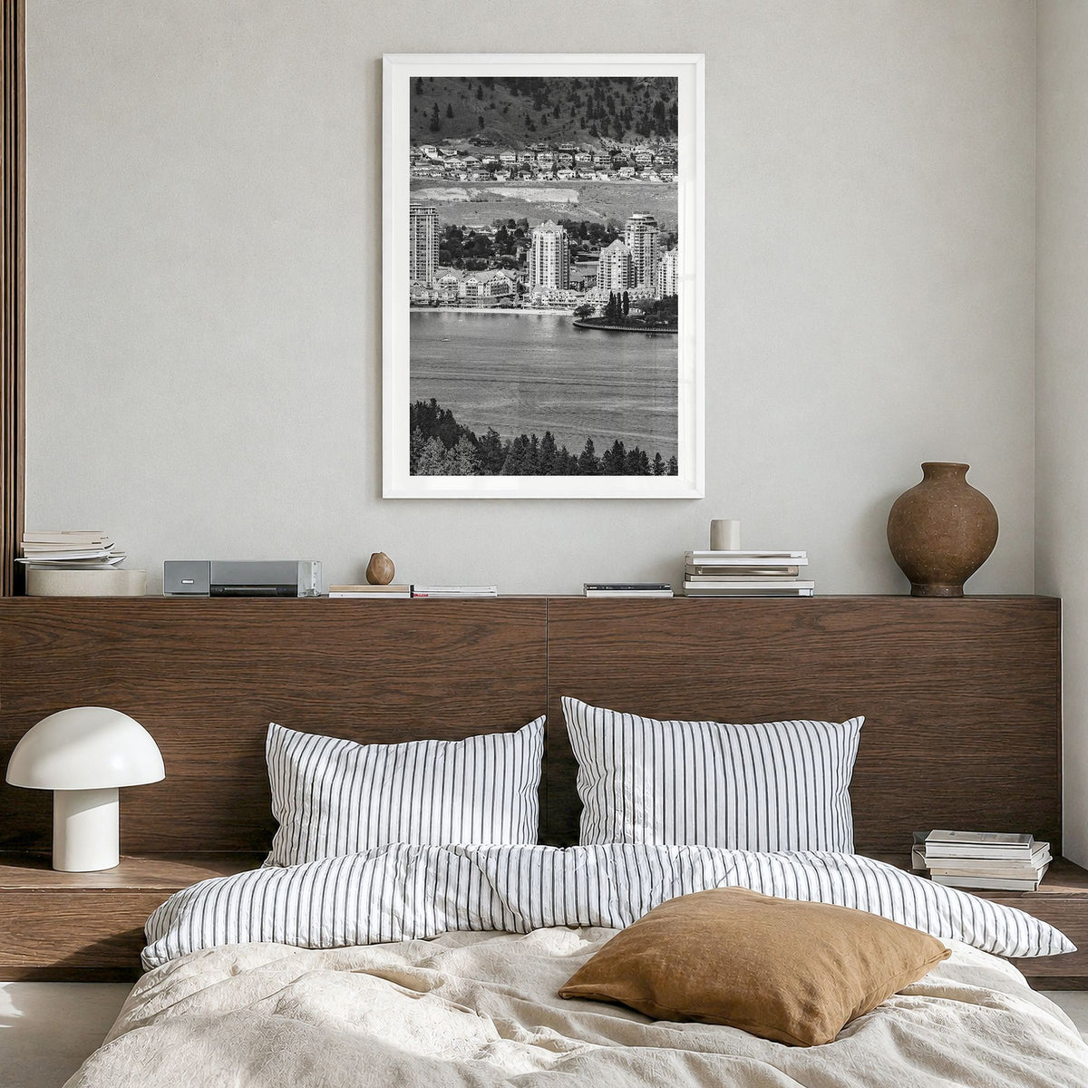 Kelowna Photo Poster in a white wood frame, hanging in a bedroom, white border