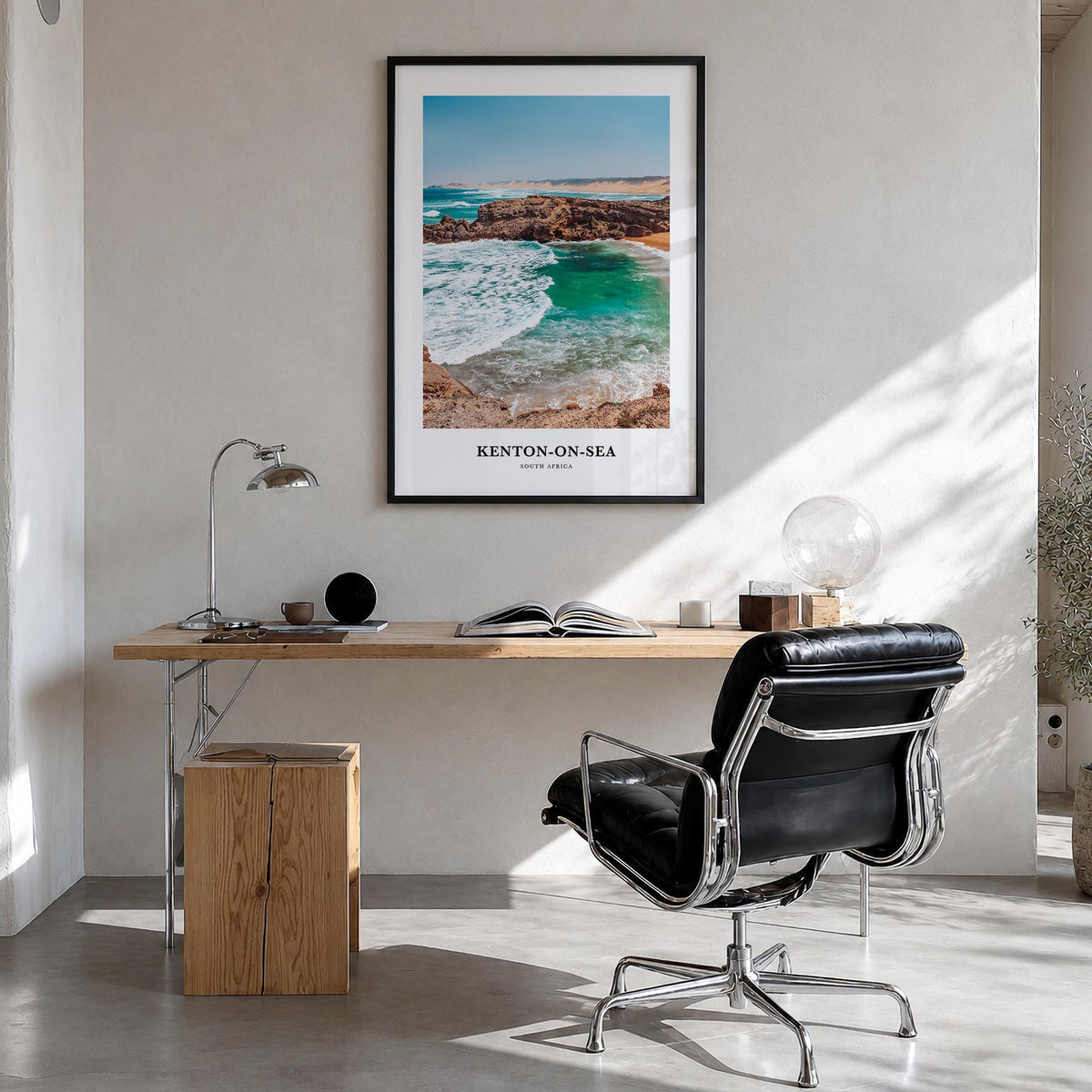 Kenton-on-Sea colorful classic poster of South Africa – vertical wall art in black wood frame, hanging on wall
