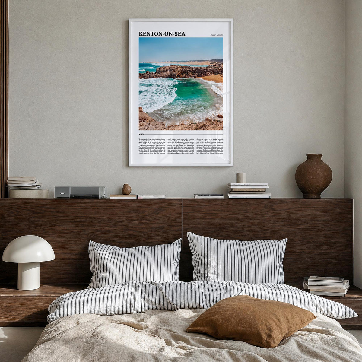 Kenton-on-Sea colorful travel poster of South Africa – vertical wall art in white wood frame, hanging on wall