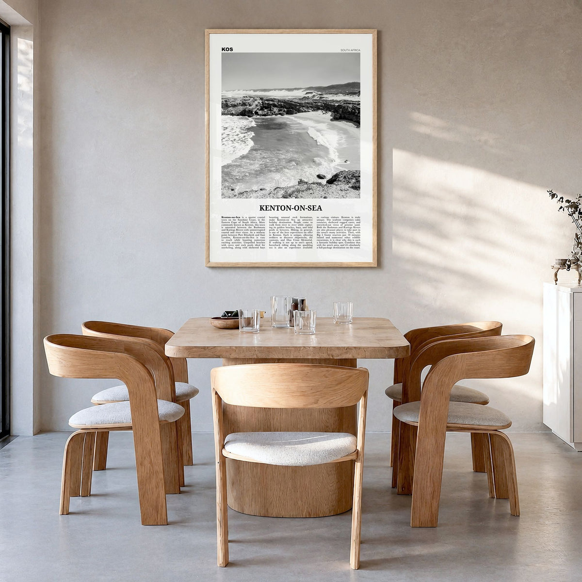 Kenton-on-Sea Newspaper Poster in a natural wood frame, hanging in a dining room