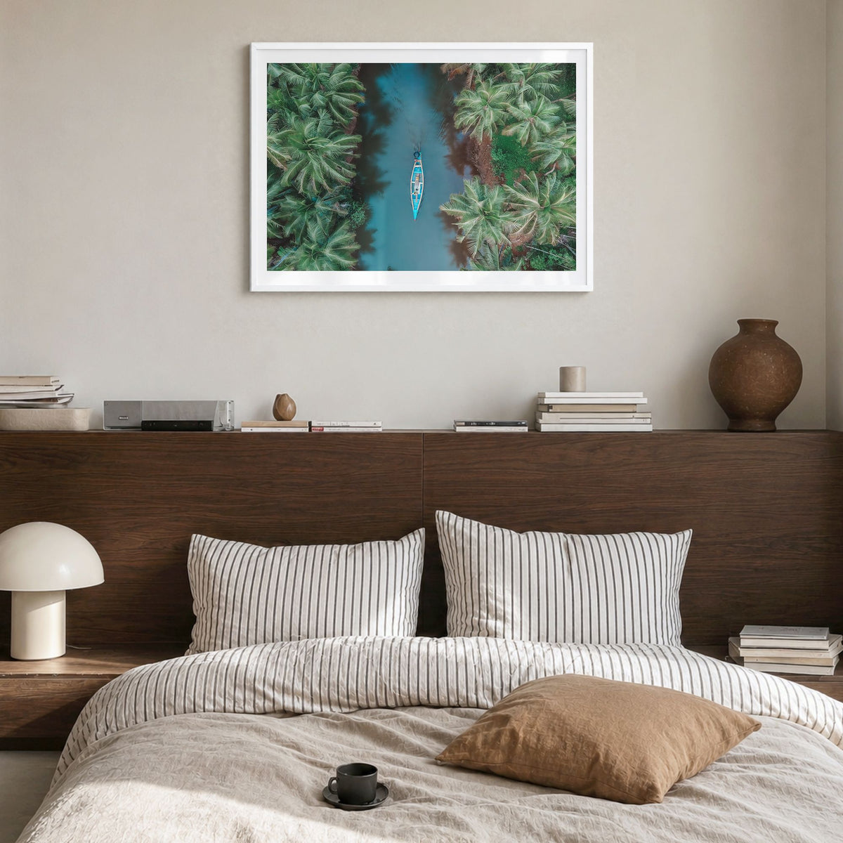 Kerala Photo Poster in a white wood frame, hanging in a bedroom, white border