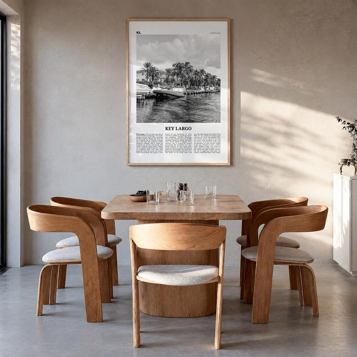 Key Largo black & white newspaper poster of Florida, USA – vertical wall art in natural wood frame, hanging on wall
