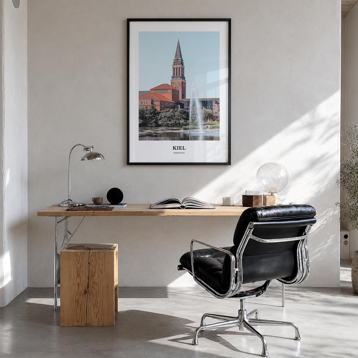 Kiel colorful classic poster of Germany – vertical wall art in black wood frame, hanging on wall