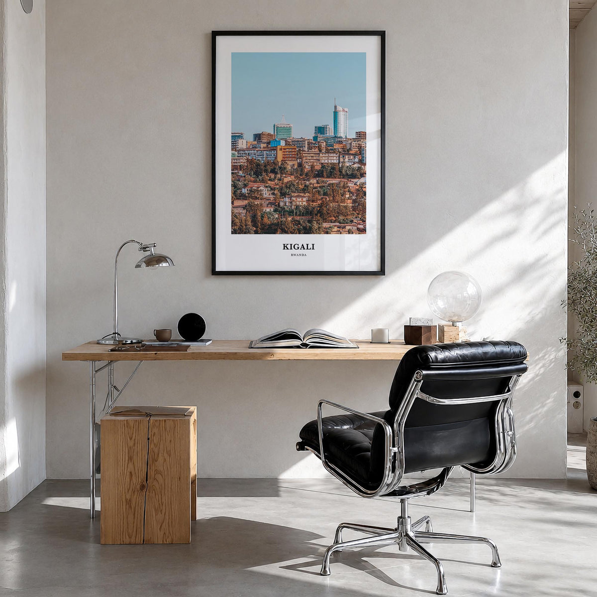 Kigali colorful classic poster of Rwanda – vertical wall art in black wood frame, hanging on wall