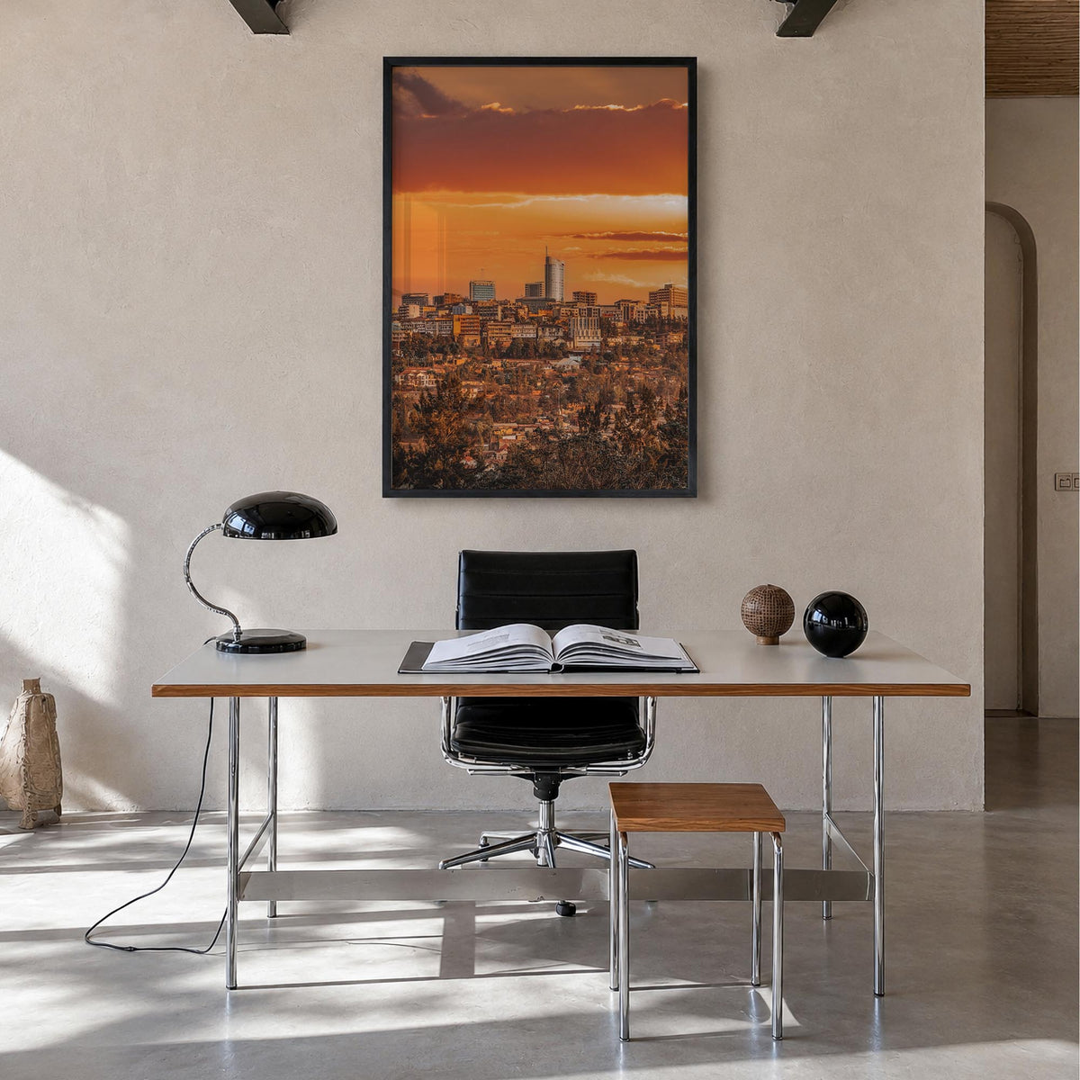 Kigali colorful photo poster of Rwanda – vertical wall art in black wood frame, hanging on wall
