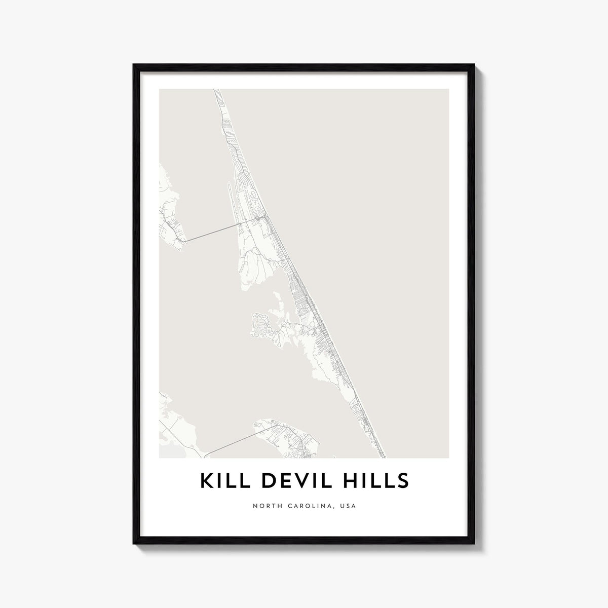 Kill Devil Hills black & white map poster of North Carolina, USA – vertical wall art, unframed print shown in interior mockup