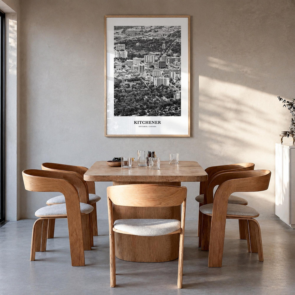 Kitchener black & white classic poster of Canada – vertical wall art in natural wood frame, hanging on wall