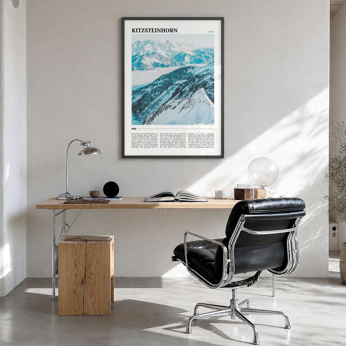 Kitzsteinhorn Travel Poster in a black wood frame, hanging in a bright home office