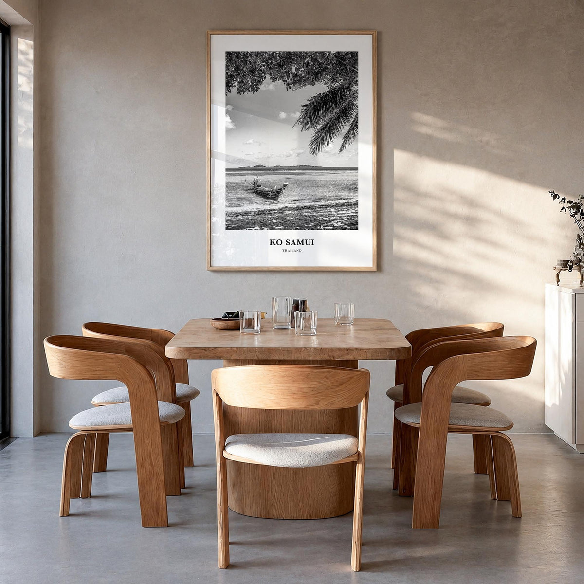 Ko Samui black & white classic poster of Thailand – vertical wall art in natural wood frame, hanging on wall