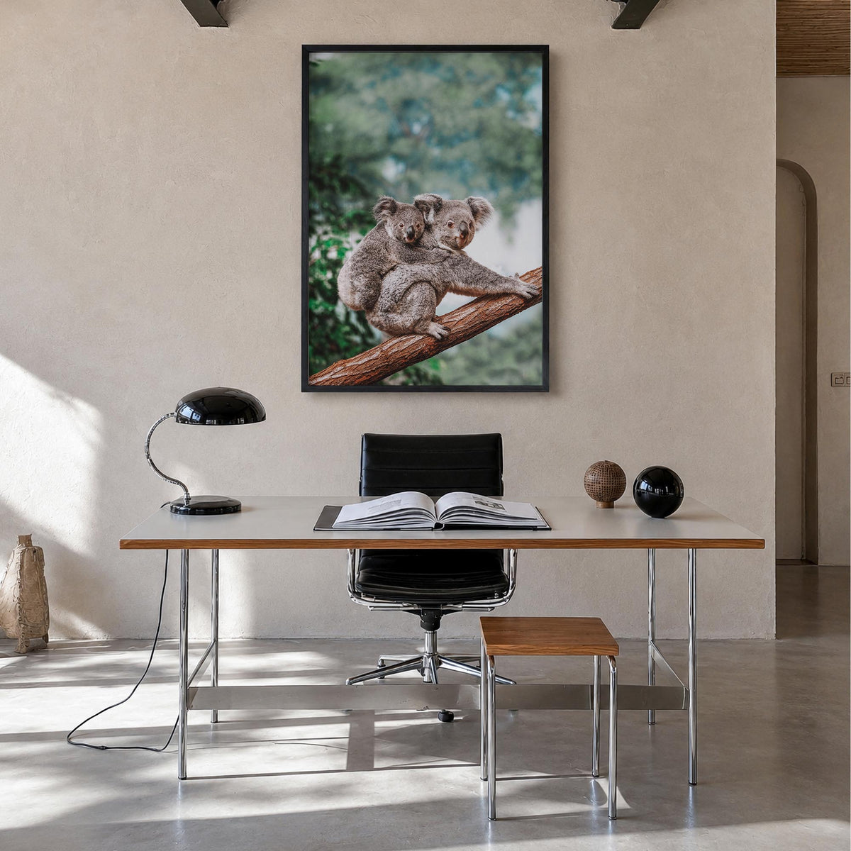 Koala colorful photo poster – vertical wall art in black wood frame, hanging on wall