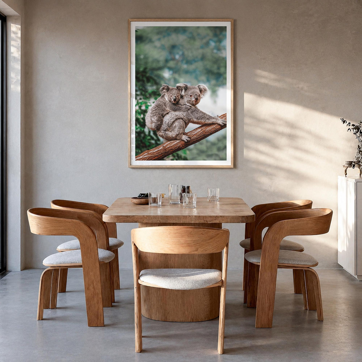 Koala colorful photo poster – vertical wall art in natural wood frame with white border, hanging on wall