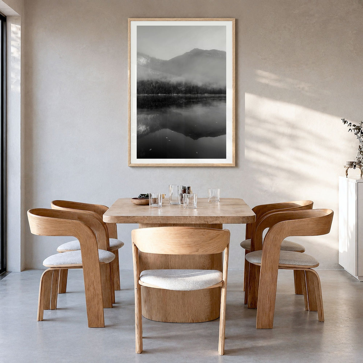 Königssee Photo Poster in a natural wood frame, hanging in a dining room, white border