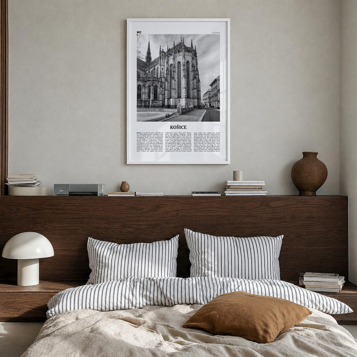 Košice black & white newspaper poster of Slovakia – vertical wall art in white wood frame, hanging on wall