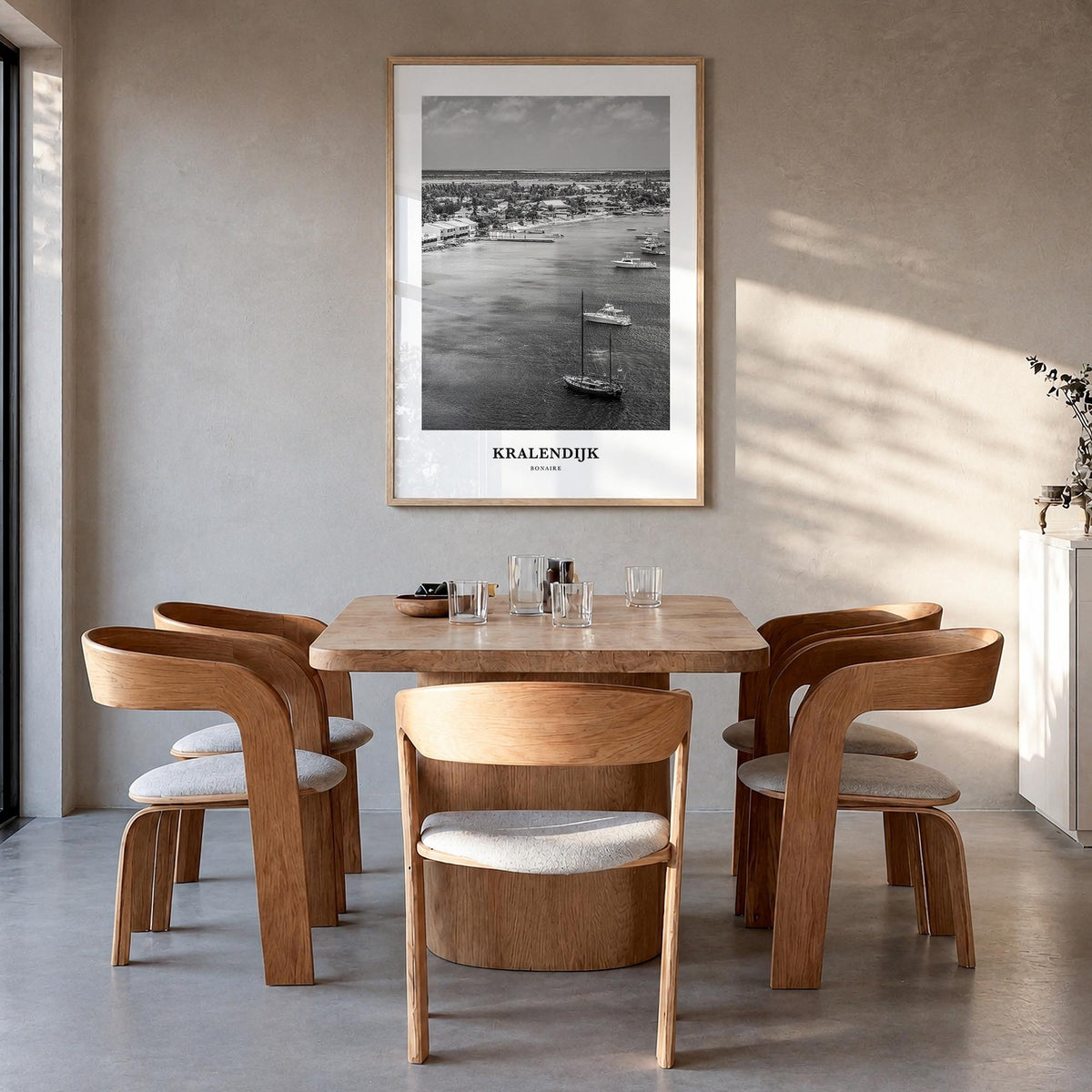 Kralendijk black & white classic poster of Caribbean – vertical wall art in natural wood frame, hanging on wall