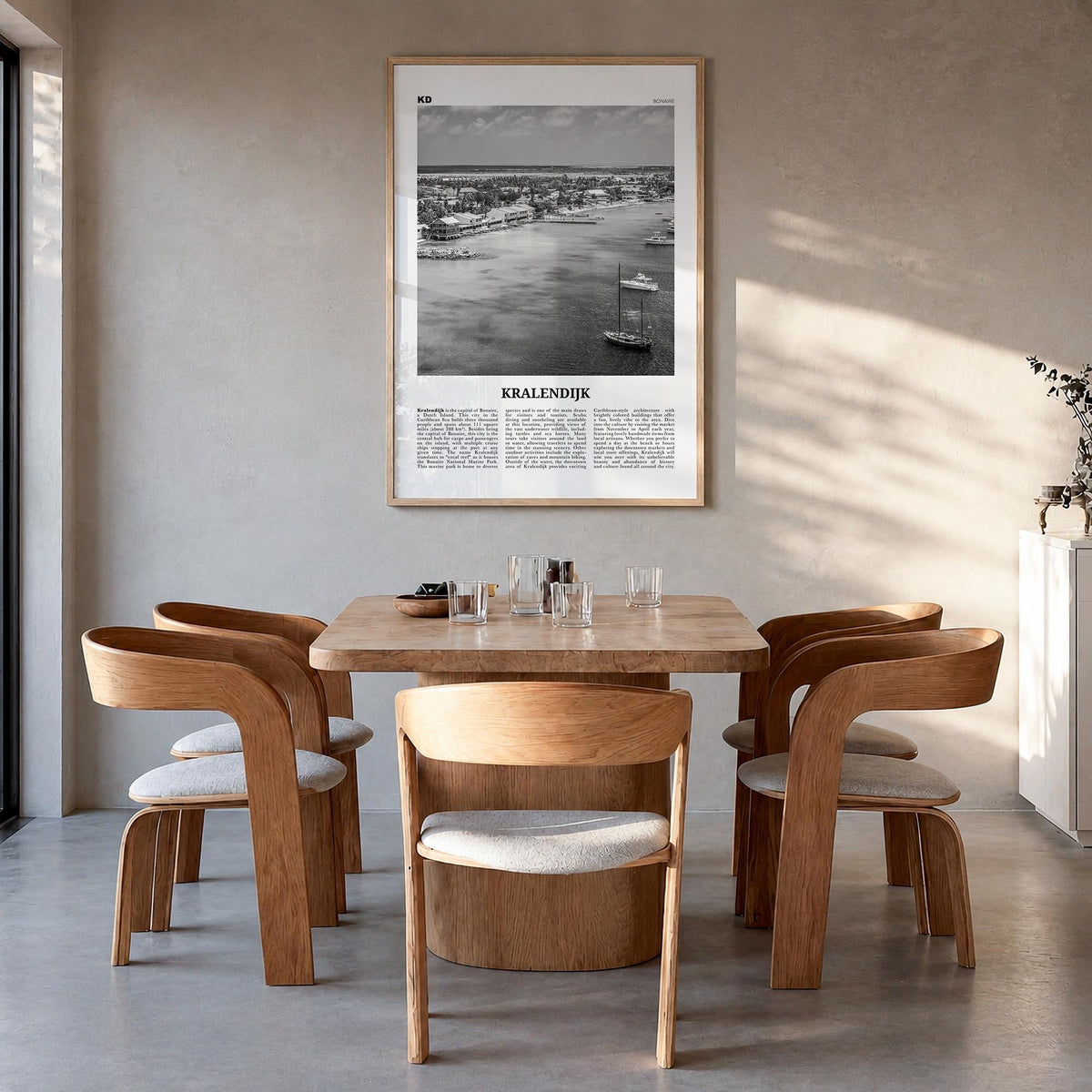 Kralendijk black & white newspaper poster of Caribbean – vertical wall art in natural wood frame, hanging on wall