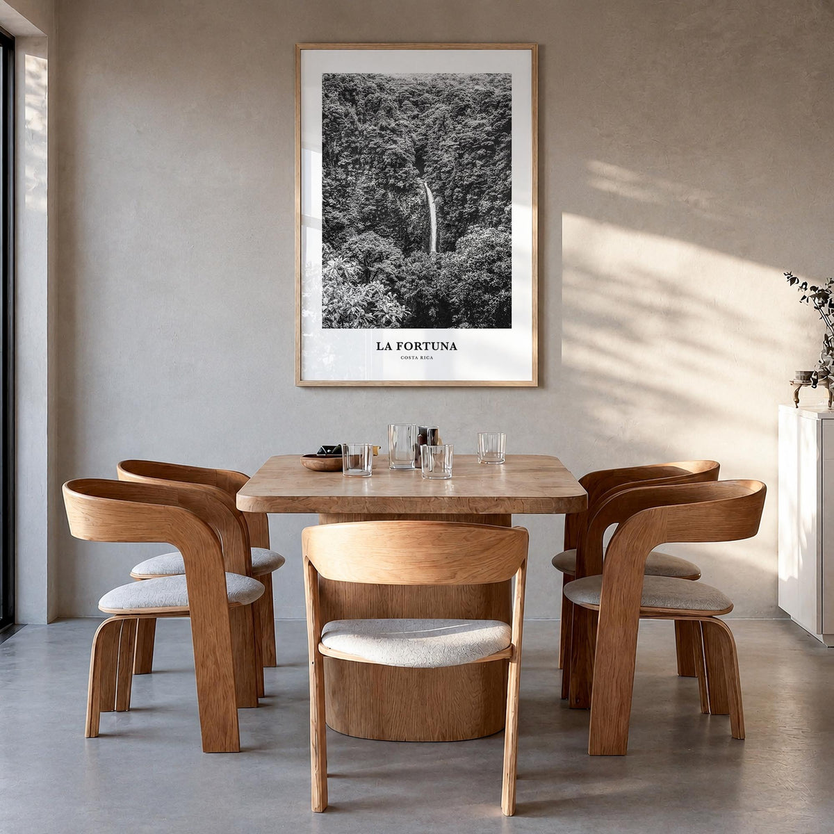 La Fortuna black & white classic poster of Costa Rica – vertical wall art in natural wood frame, hanging on wall