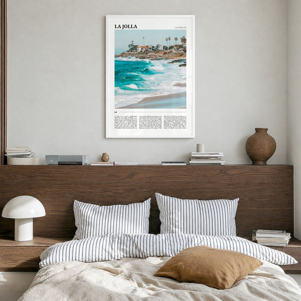 La Jolla Travel No 2 Poster in a white wood frame, hanging in a bedroom