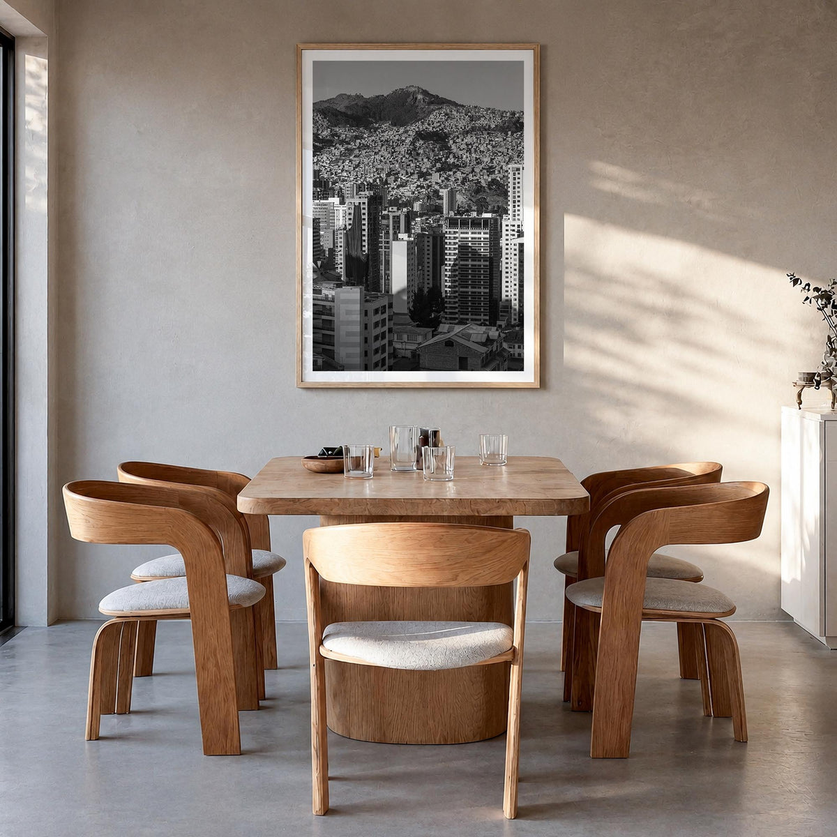 La Paz black & white photo poster of Bolivia – vertical wall art in natural wood frame with white border, hanging on wall