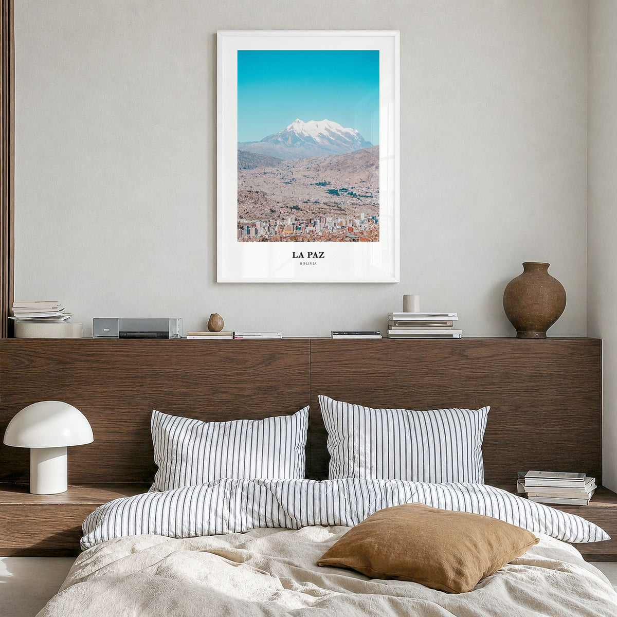 La Paz Classic Poster in a white wood frame, hanging in a bedroom