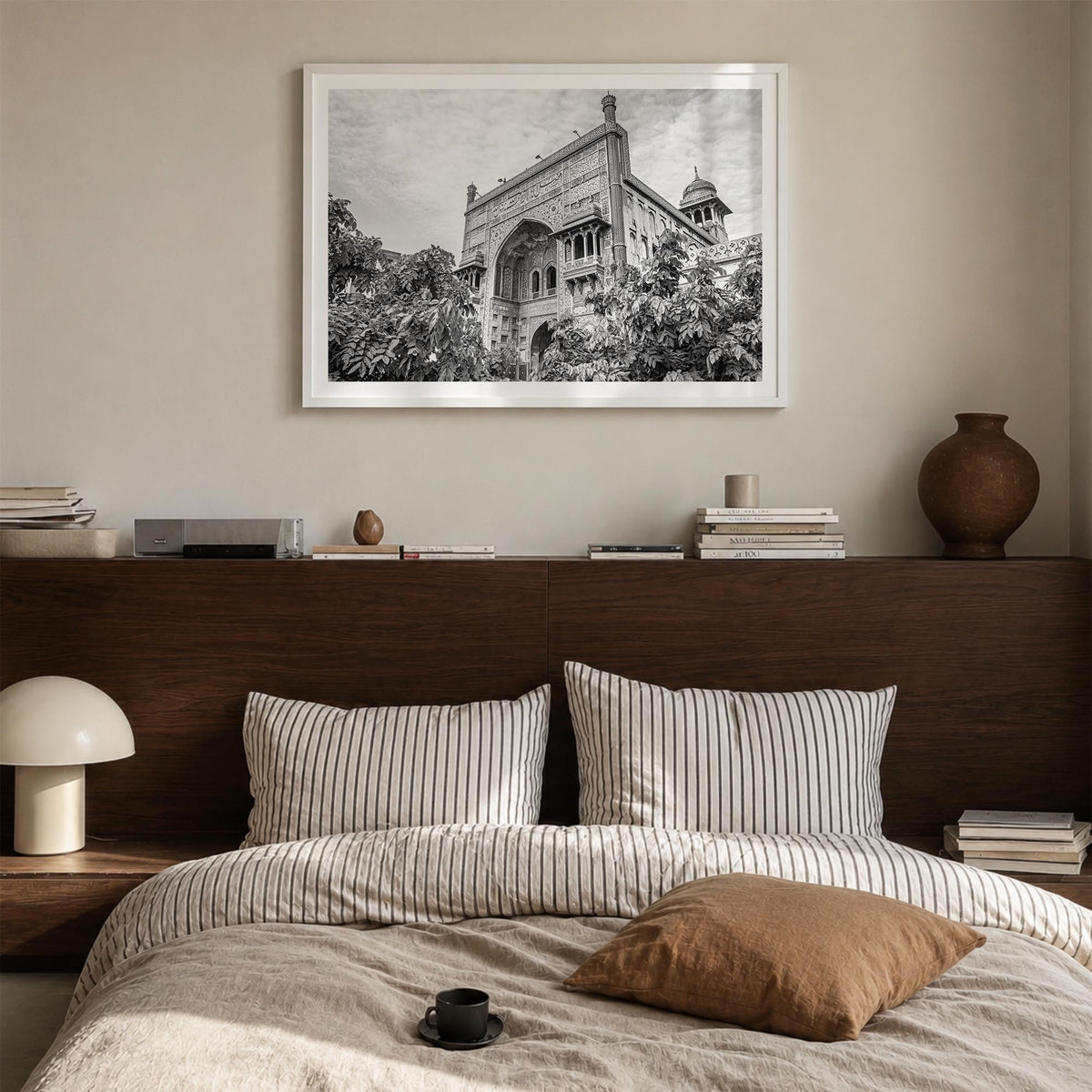 Lahore black & white photo poster of Pakistan – horizontal wall art in white wood frame with white border, hanging on wall