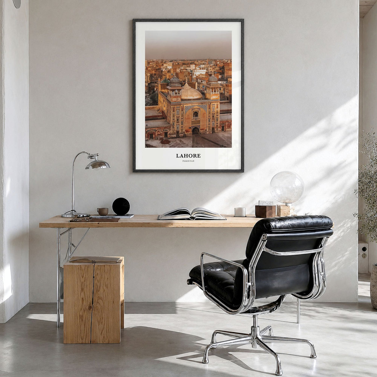 Lahore Classic Poster in a black wood frame, hanging in a bright home office