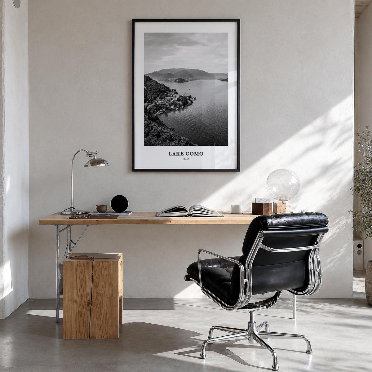 Lake Como black & white classic poster of Italy – vertical wall art in black wood frame, hanging on wall
