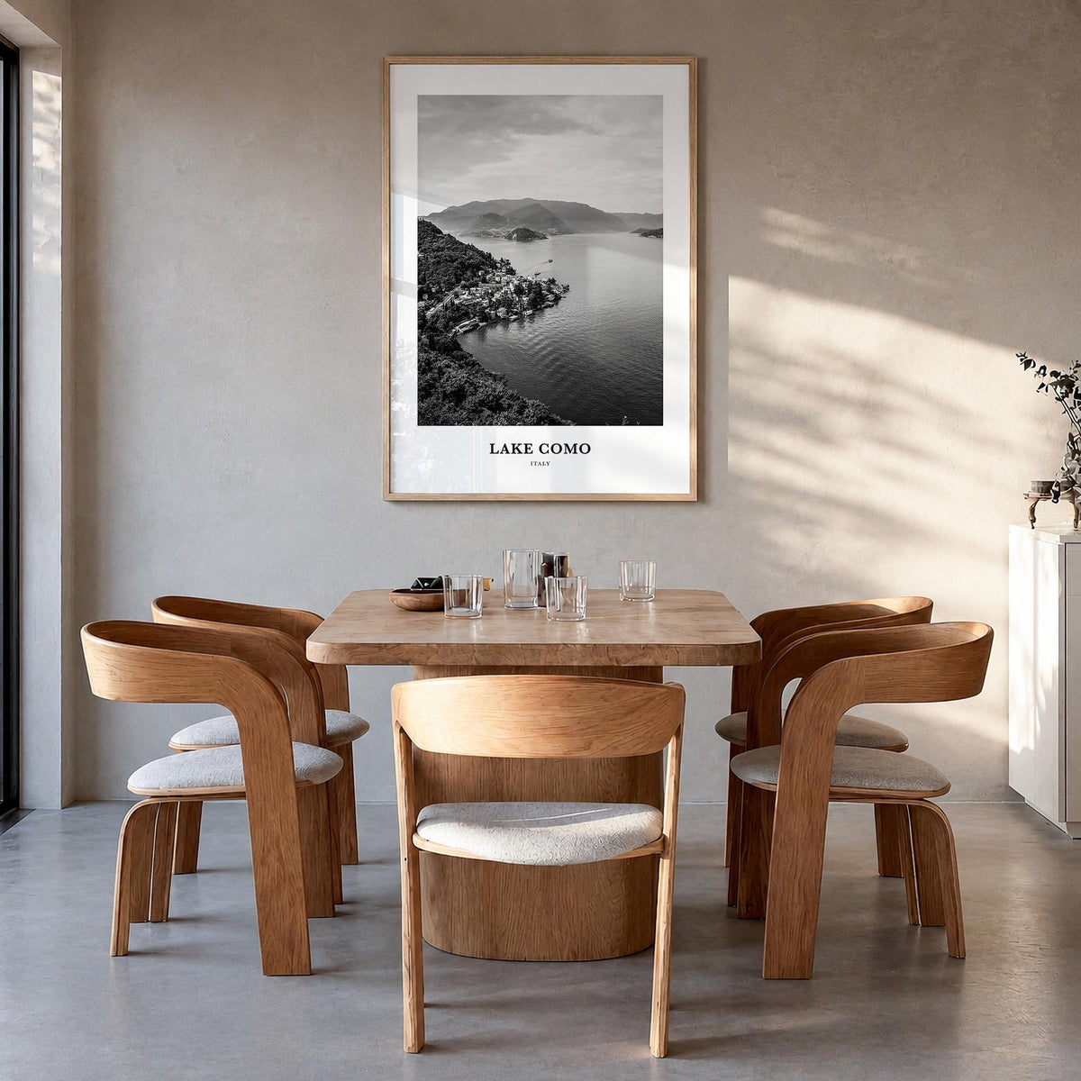 Lake Como black & white classic poster of Italy – vertical wall art in natural wood frame, hanging on wall
