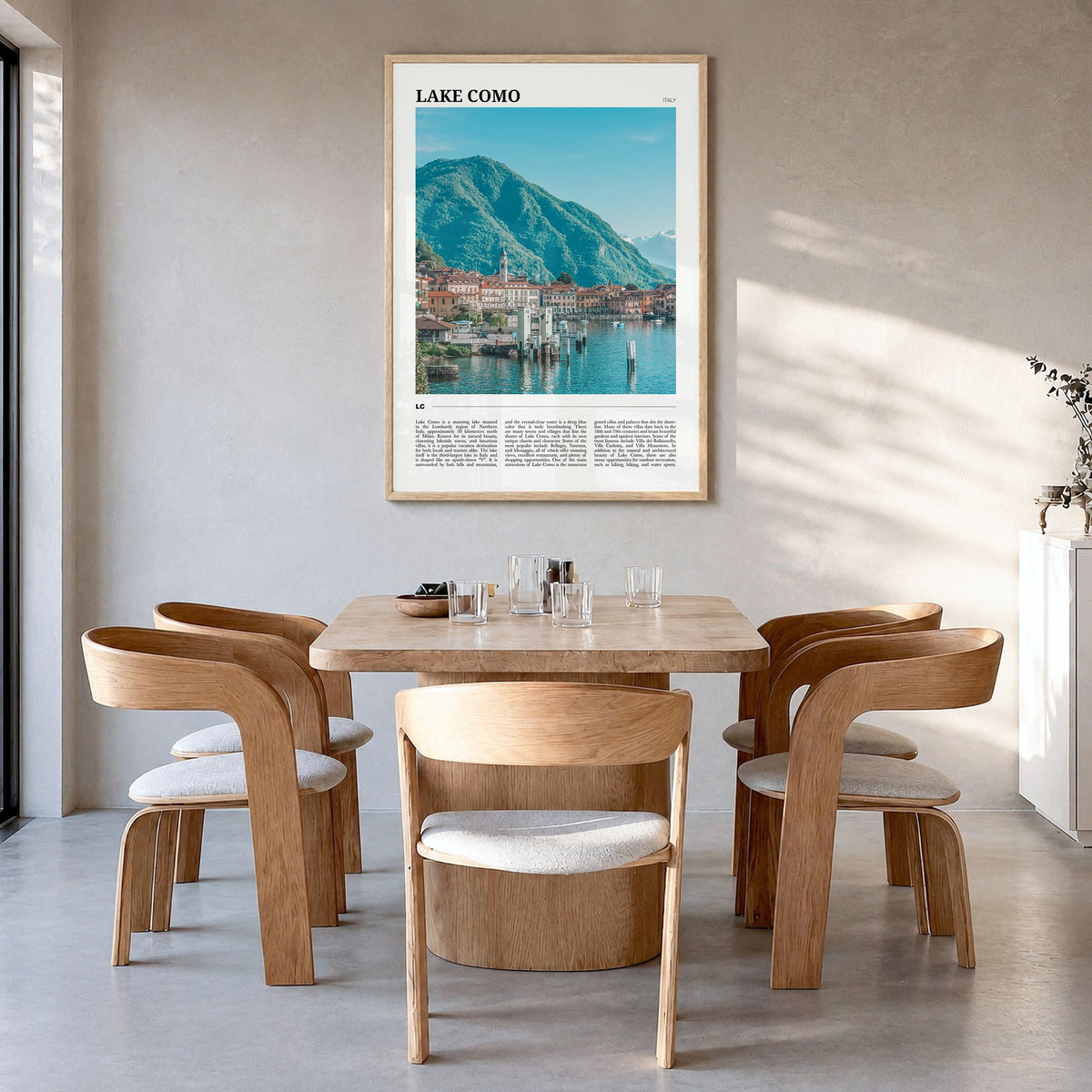 Lake Como Travel No 2 Poster in a natural wood frame, hanging in a dining room