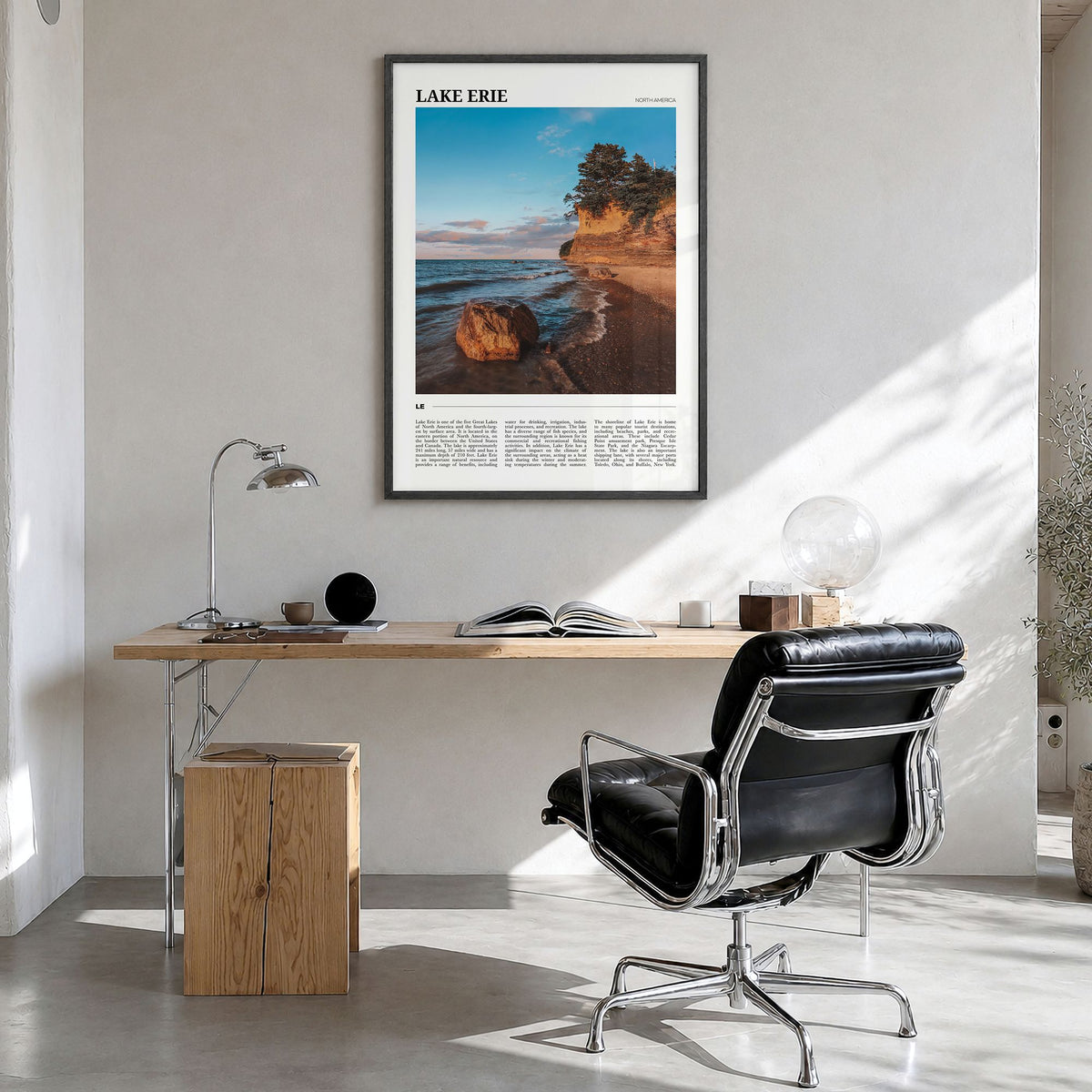 Lake Erie Travel Poster in a black wood frame, hanging in a bright home office
