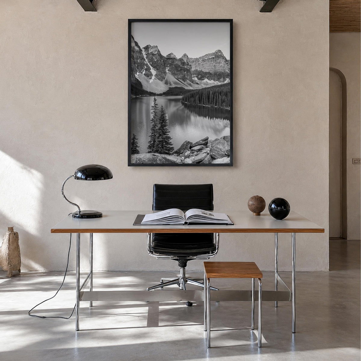 Lake Louise black & white photo poster of Alberta, Canada – vertical wall art in black wood frame, hanging on wall