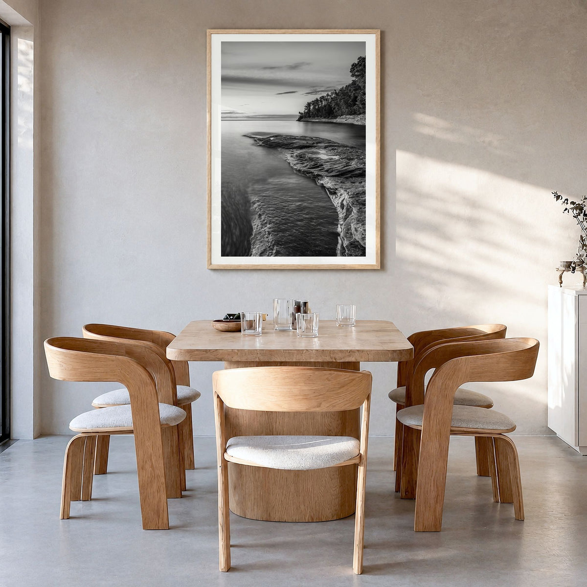 Lake Michigan Photo No 1 Poster in a natural wood frame, hanging in a dining room, white border