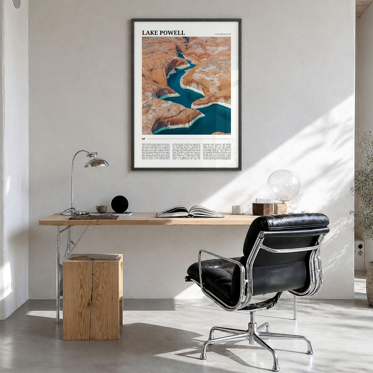 Lake Powell Travel Poster in a black wood frame, hanging in a bright home office