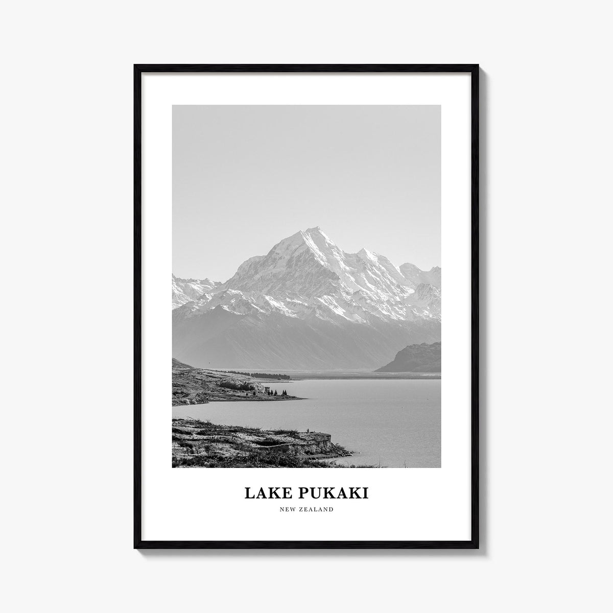 Lake Pukaki black & white classic poster of New Zealand – vertical wall art, unframed print shown in interior mockup