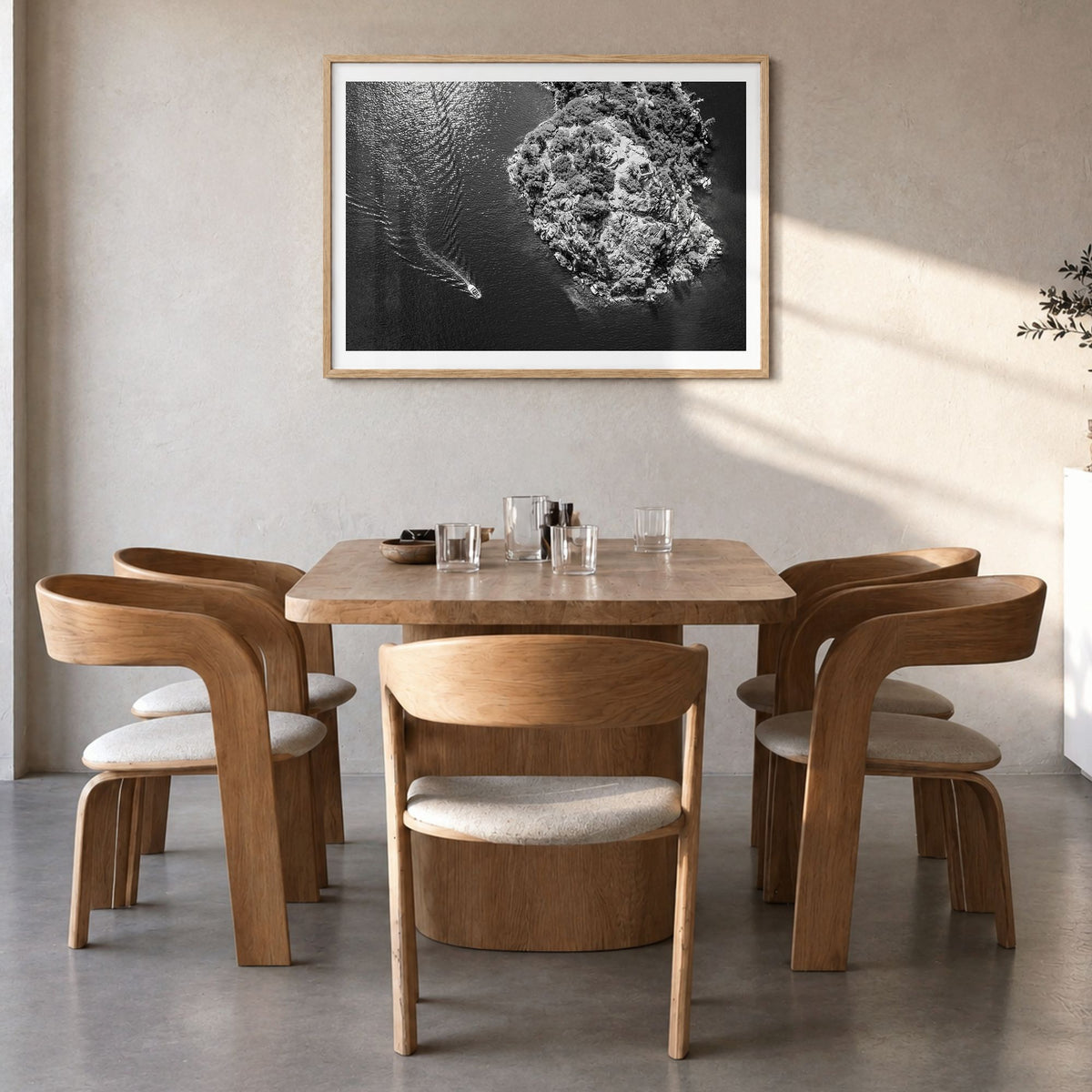 Lake Tahoe Photo Poster in a natural wood frame, hanging in a dining room, white border