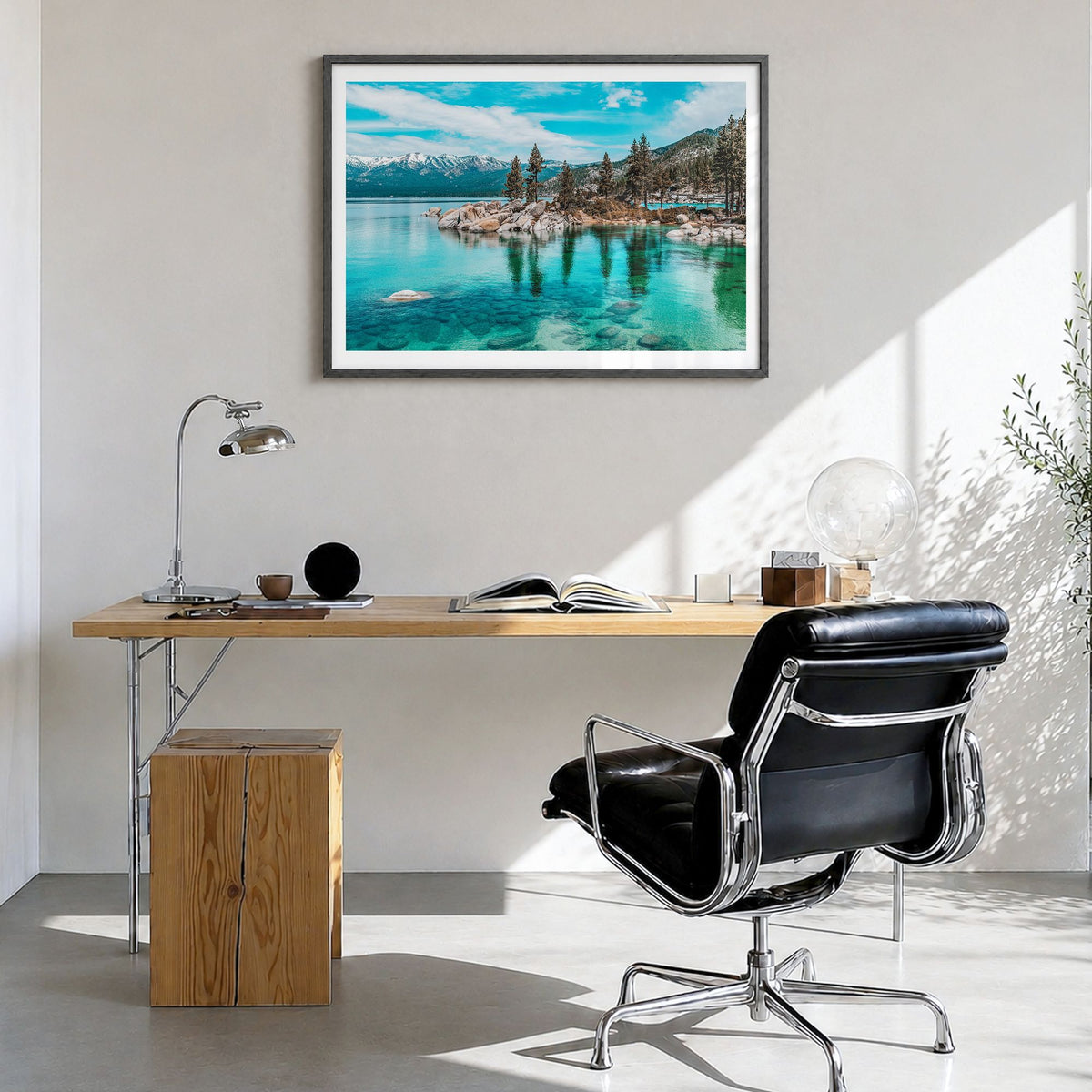 Lake Tahoe Photo Poster in a black wood frame, hanging in a bright home office, white border